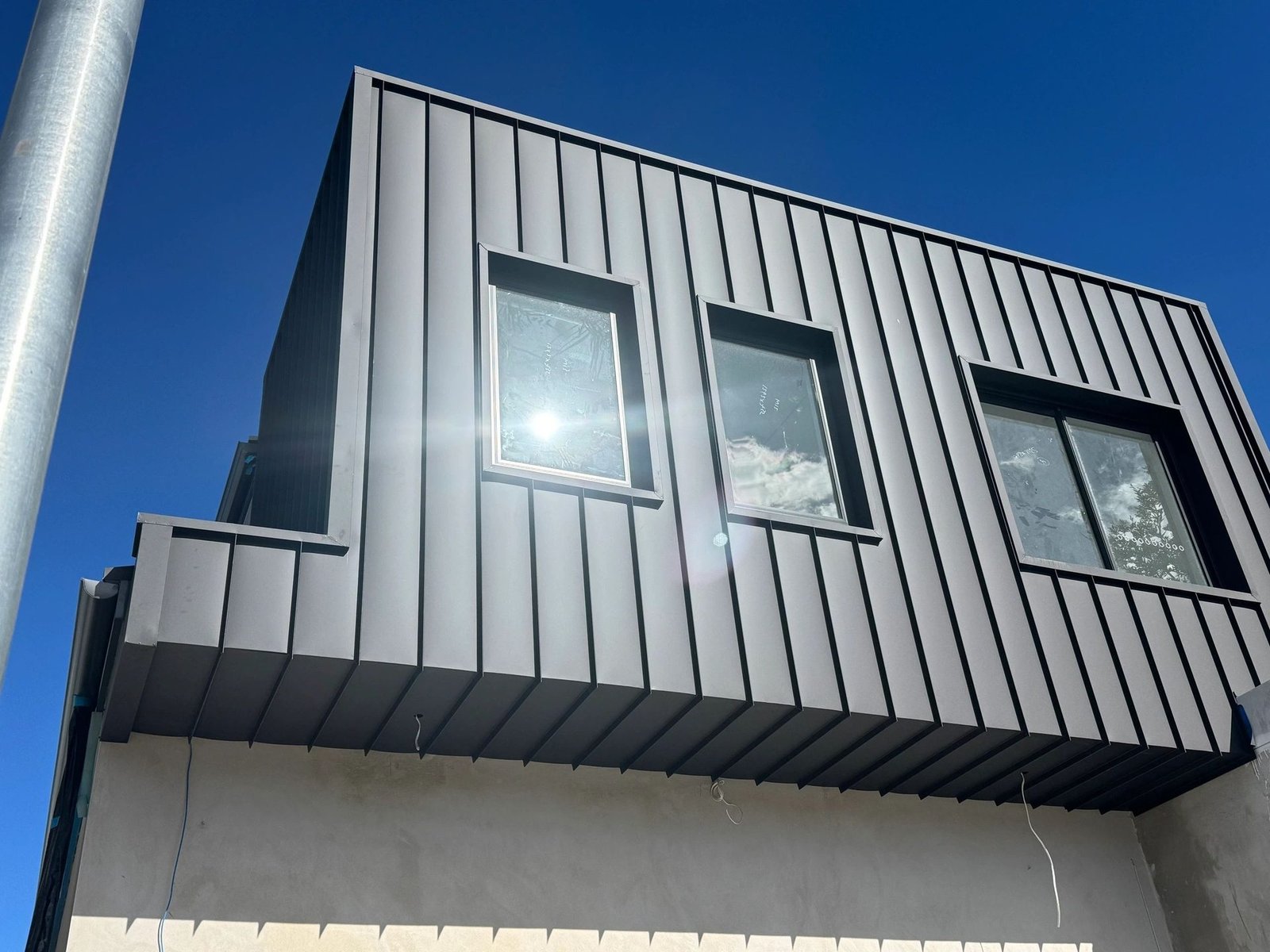Nailstrip wall cladding installed by Reborn Metal Roofing in Rosebery