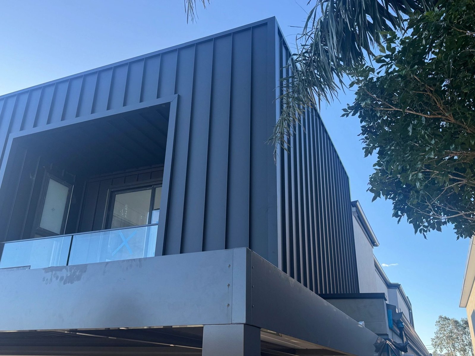 Colorbond clad upper storey of a modern home
