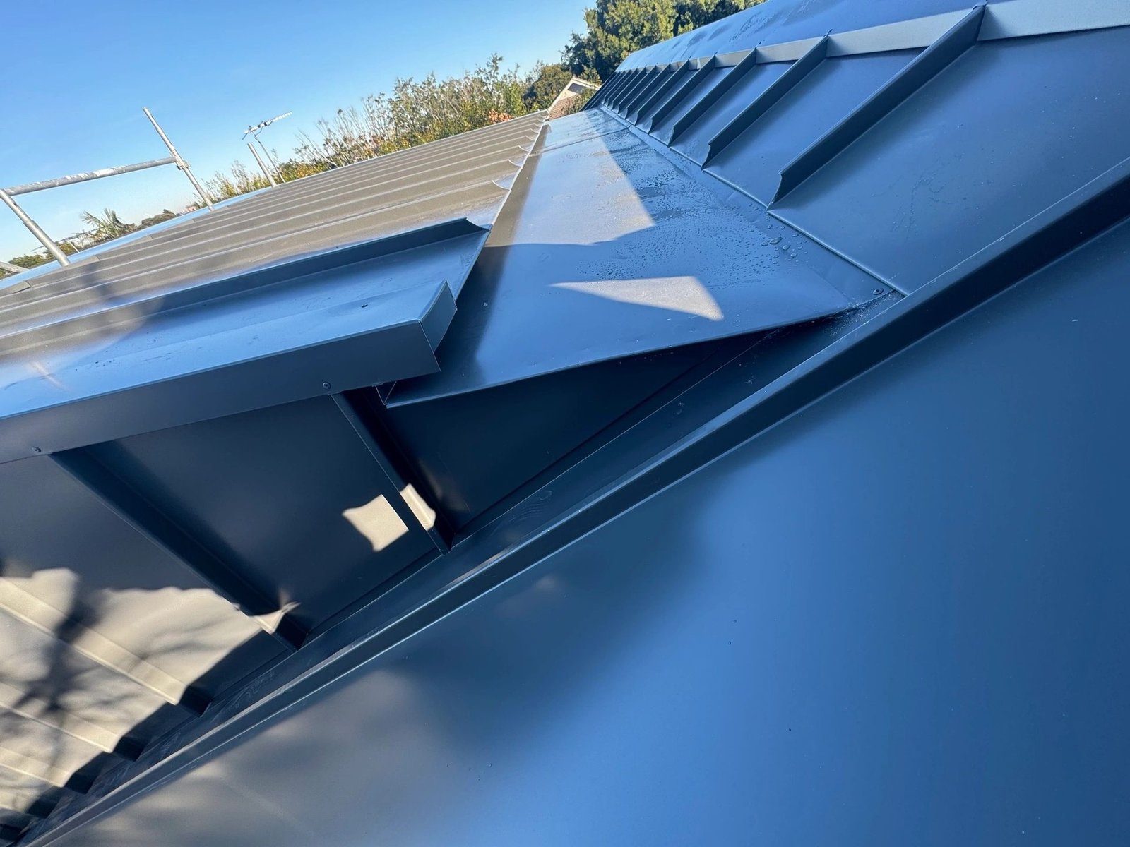 Standing seam roof sheets catching the sun
